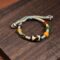 Hand-Woven Agate Bracelet with Tibetan Dzi Beads